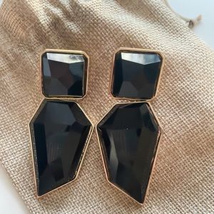 Black statement earrings.
